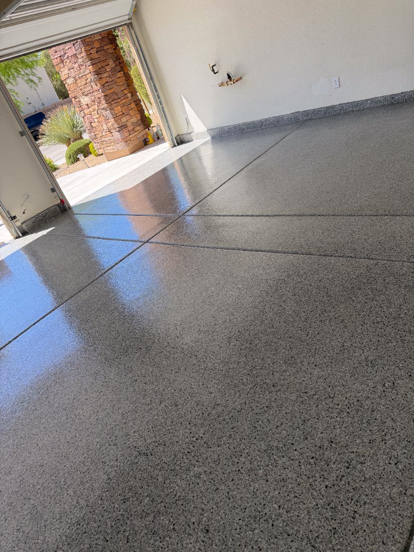 Dark grey flake epoxy garage floor in Las Vegas, NV by Tabwa Coatings